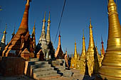 Inle Lake Myanmar. Indein, on the summit of a hill the  Shwe Inn Thein Paya a cluster of hundreds of ancient stupas. Many of them are ruined and overgrown with bushes. 